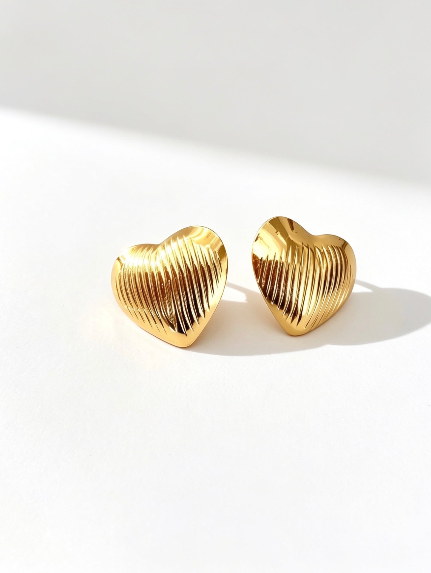 Aretes Love